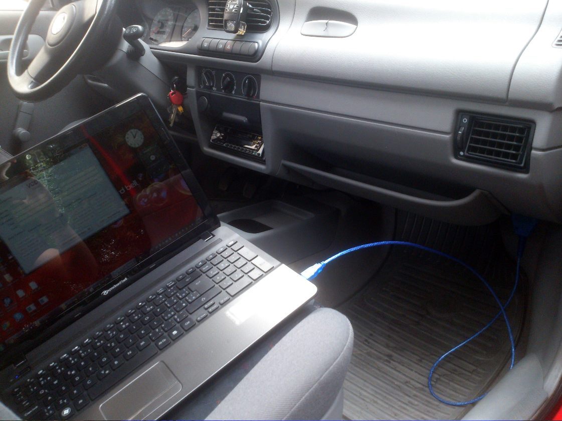 Car diagnostics with laptop and OBD